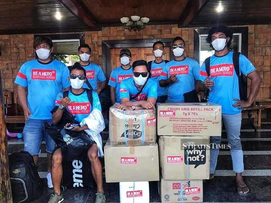 'Semporna Heroes' help out in Johor flood evacuation, clean-up